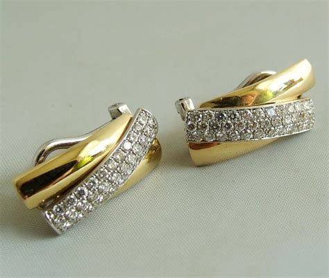 gouden oorbellen 18 karaat bijenkorf